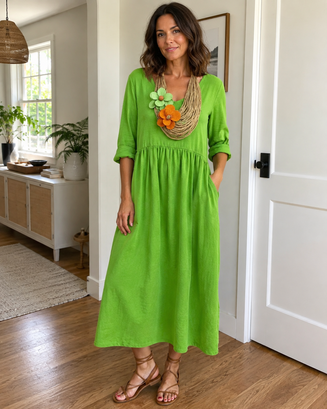 Vestido longo de linho com gola redonda e bolsos